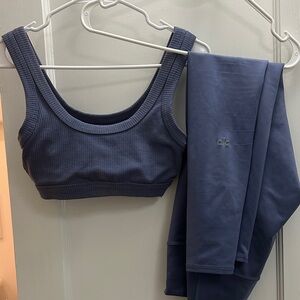 ALO Infinity Blue Ribbed Wellness Sports Bra and 7/8 High-Waist Airlift Leggings